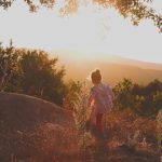a man standing on a rock